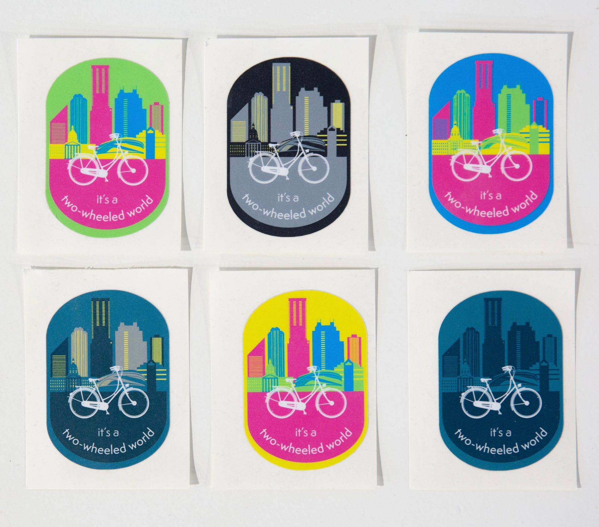 IT'S A TWO-WHEELED WORLD Logo Stickers